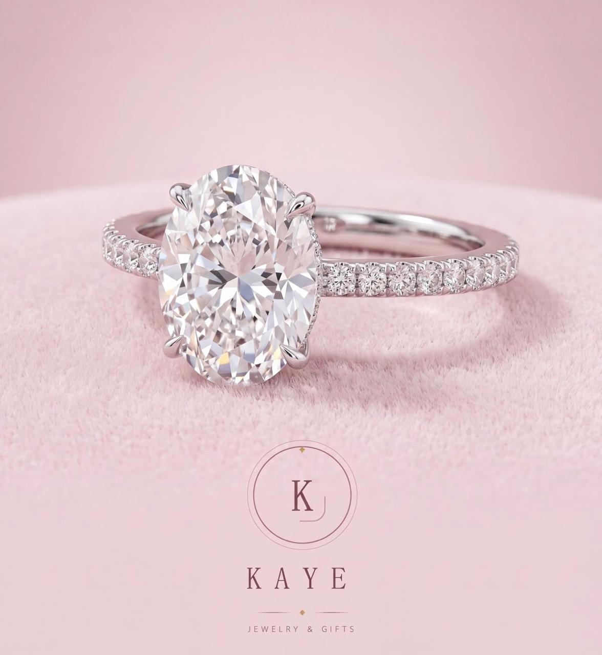 Oval Cut With Side Stones Solitaire Ring